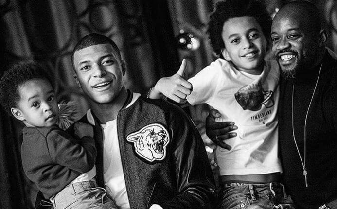 Ethan Mbappe with his brothers, Kylian Mbappe and Jires Kembo Ekoko, and little nephew.